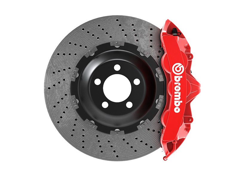 High-performance Brembo brake rotor and red caliper.
