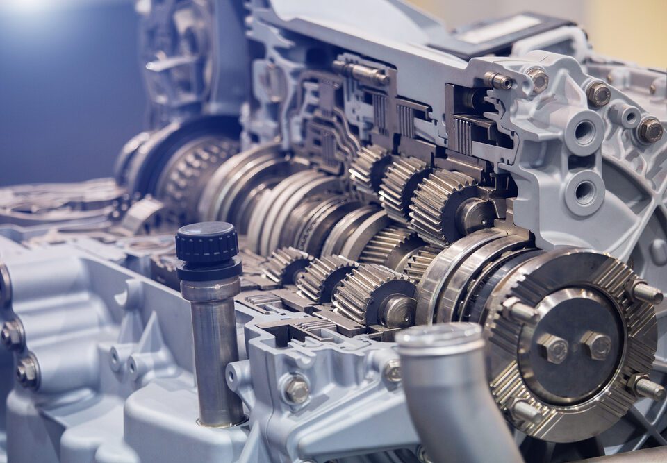 Close-up of mechanical gears inside an engine.